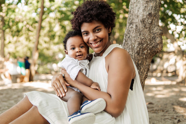 new mom and baby outside