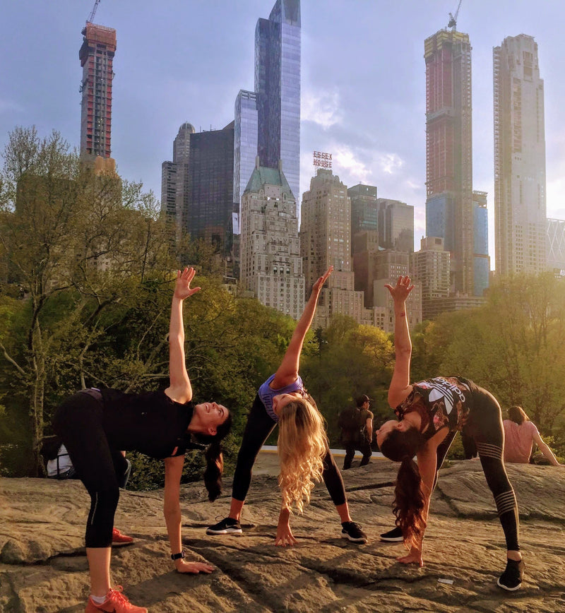 3-women-doing-yoga-in-central-park-jpg