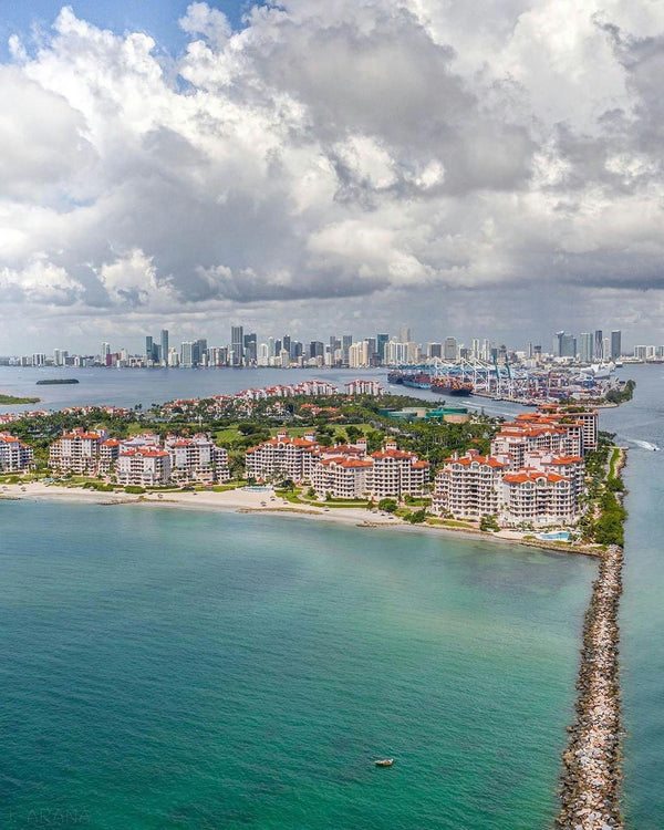 two women posed with plane