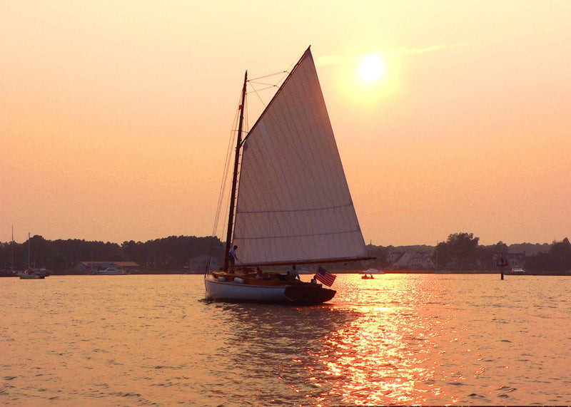 at-sunset-sail-selina-ii-st-michaels-md-intimate-gay-wedding-sailing-charters-same-sex-boating-chesapeake-bay-romantic-sunset-cruises-champagne-lesbian-elopement-packages-lgbt-engagement-seaside-wedding-beach-wedding-coastal-wedding-jpg