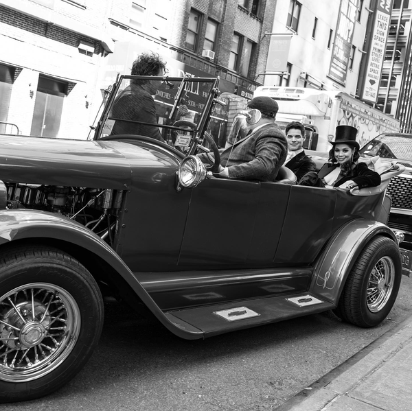 man looking out window