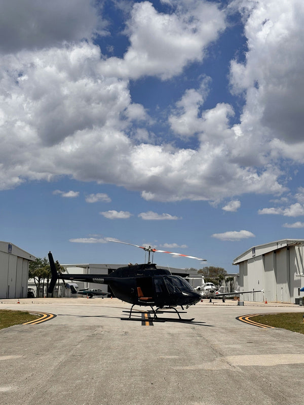 man flying helicopter