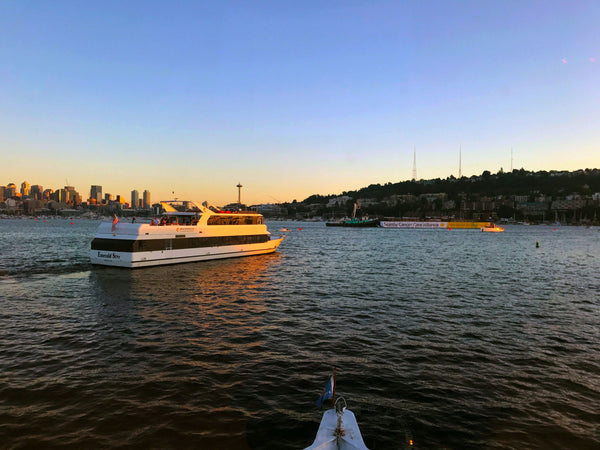 boat sailing at sunset