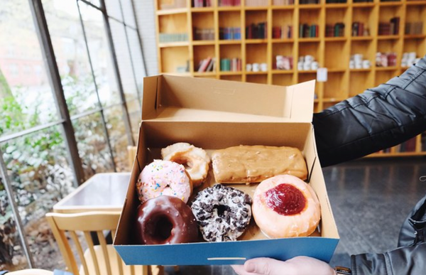 chocolate donut with a bite out of it