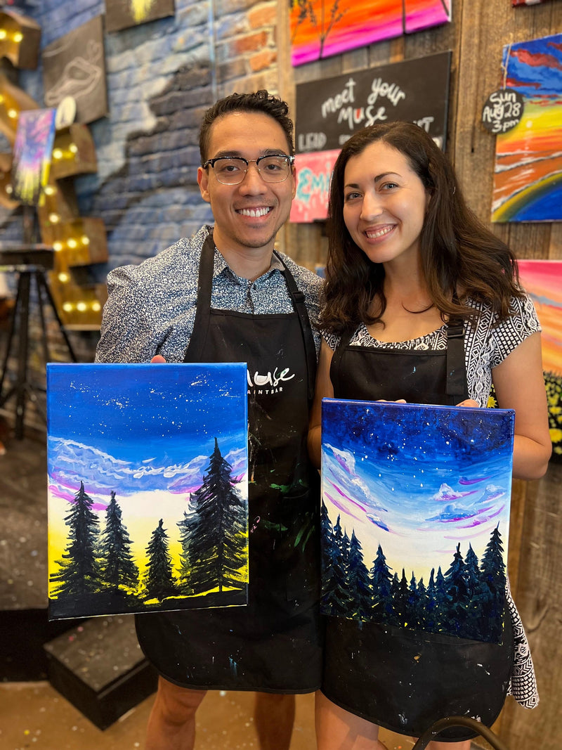 couple-with-paintings-of-trees-at-night