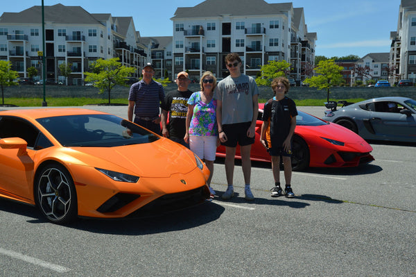 man with white convertible