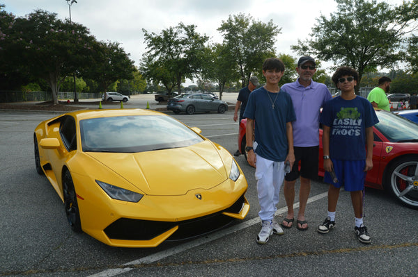 couple with silver car