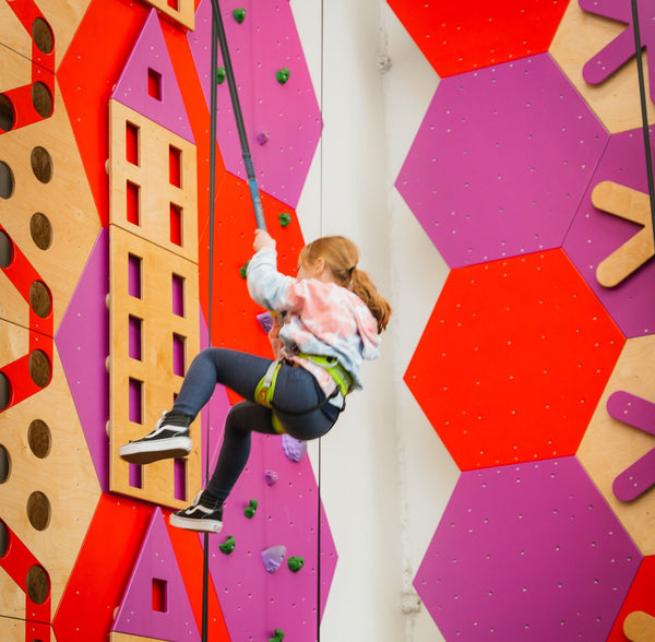 kid climbing wall.jpeg