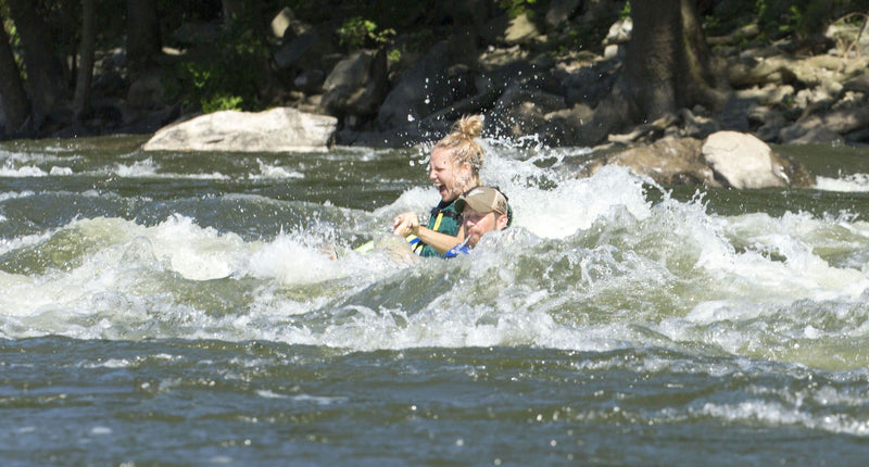girl-white-water-tubing