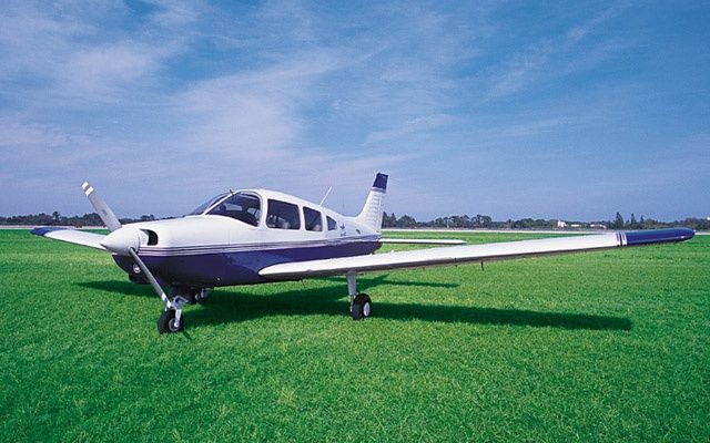 grounded-airplane-on-grass