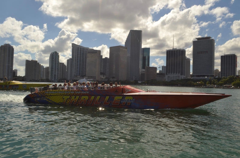 group-on-speedboat-with-miami-skyline-in-background