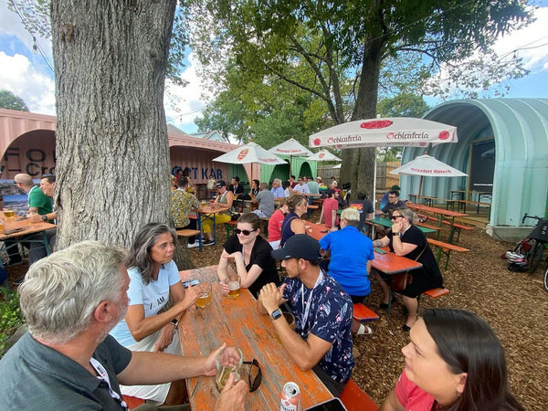 co-ed group outside of bus