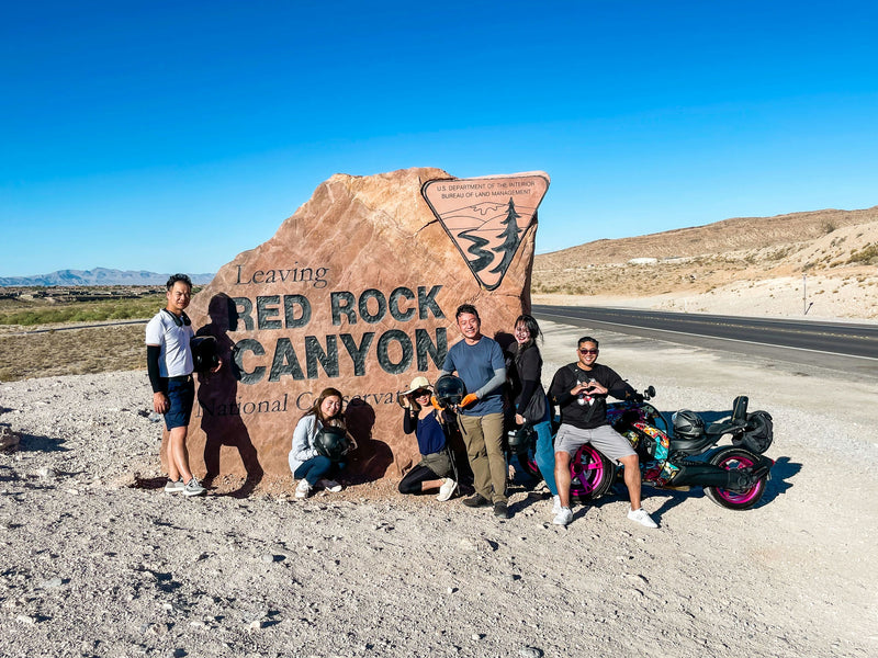 group-photo-with-red-rock-canyon-sign