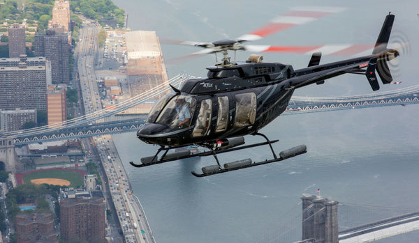 sharp dressed man getting on a helicopter.jpg