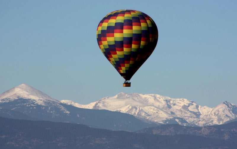 hot-air-balloon-with-snowy-mountains