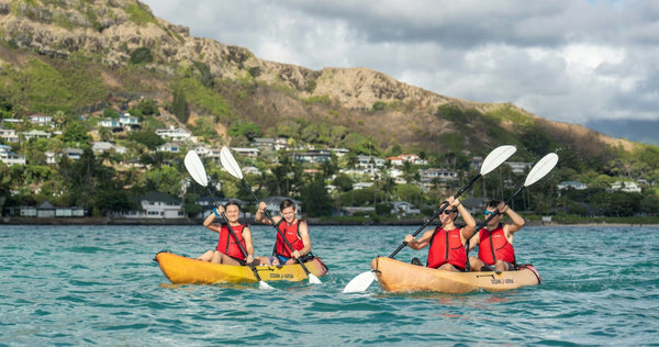 Kayakers paddling their rental kayak in Kailua near Flat Island.jpg