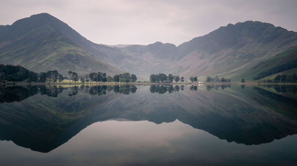 landscape of house over calm lake