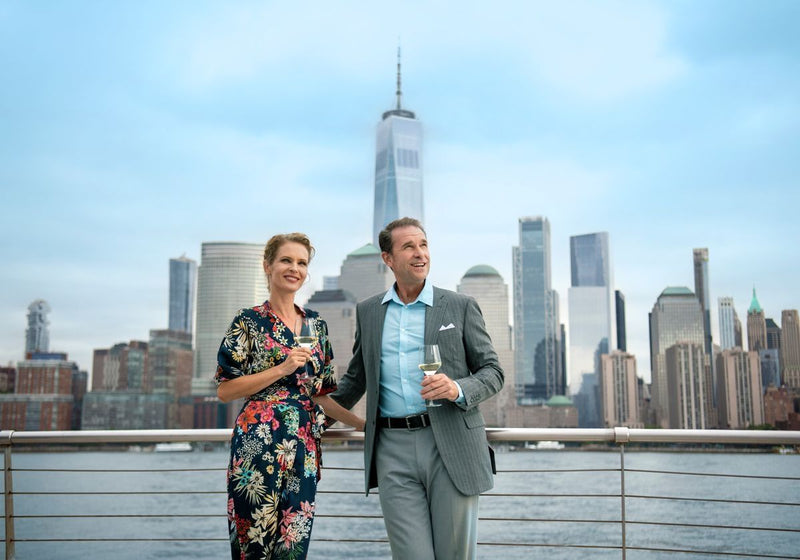 man-and-woman-drinking-wine-on-deck-of-lunch-cruise