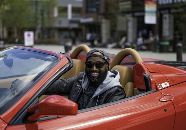 Red super car in country