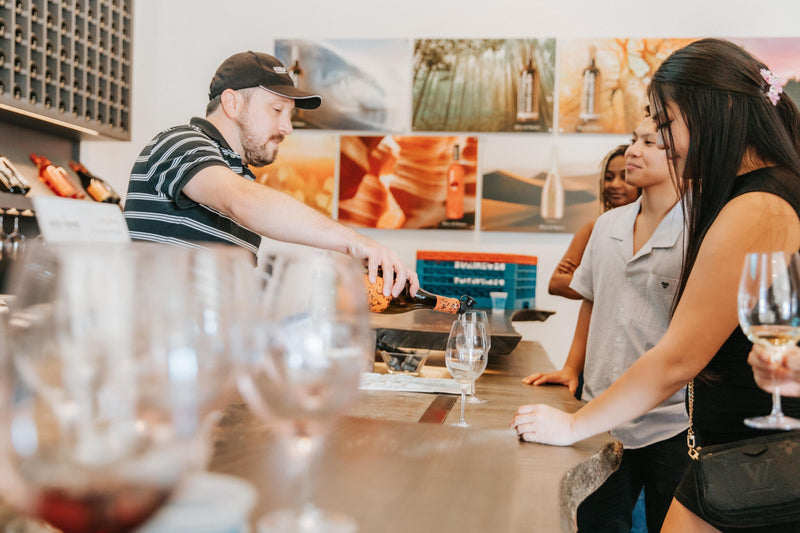 man-serving-wine-tasting