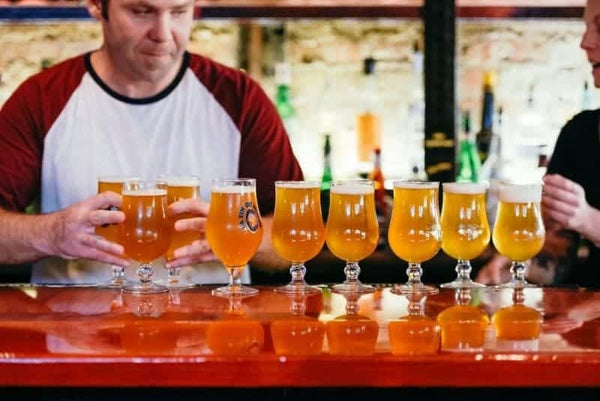 samples of beer on a tray