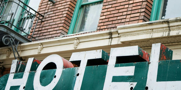 a family laughing around picnic spread.jpg