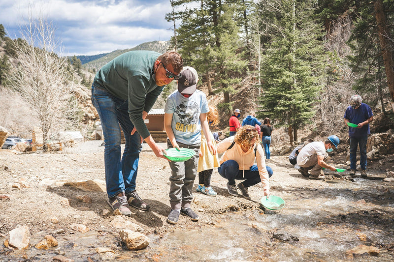 people sifting in river for gold.jpg