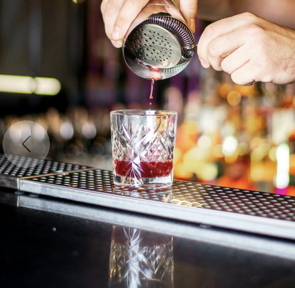 pouring from shaker to glass
