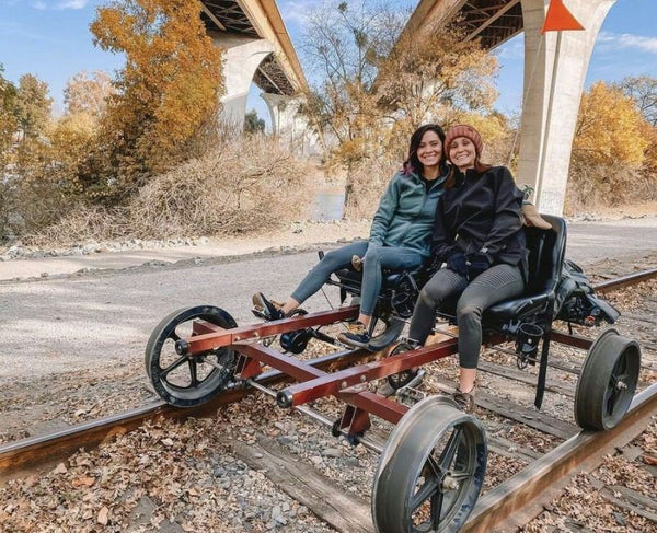 Solo Traveler Relaxing on Railbike Ride