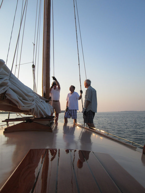 raising sails at the mast, selina II, st michaels md, hatch.JPG