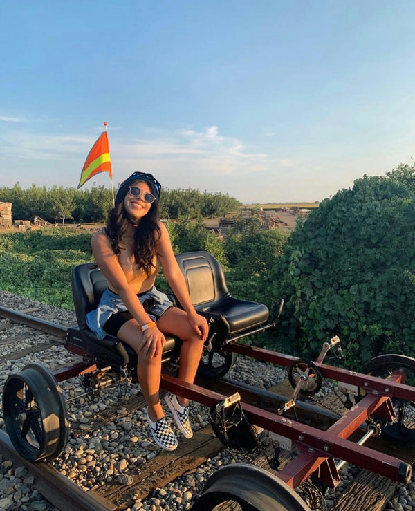 Solo Traveler Relaxing on Railbike Ride