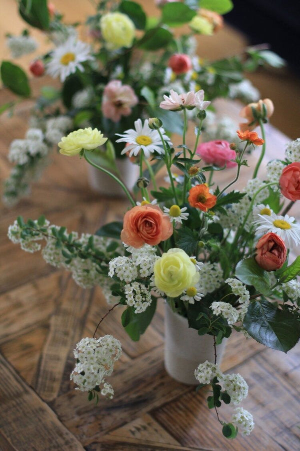 woman making a floral arrangement zoomed