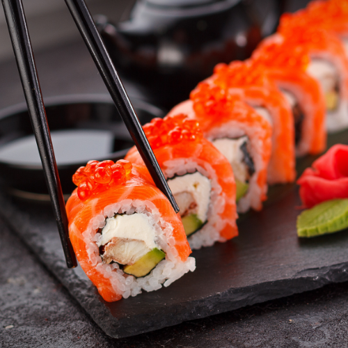 Sushi roll and chopsticks