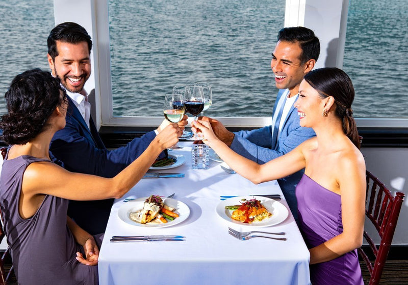 two-couples-on-signature-lunch-cruise-in-nj-toasting