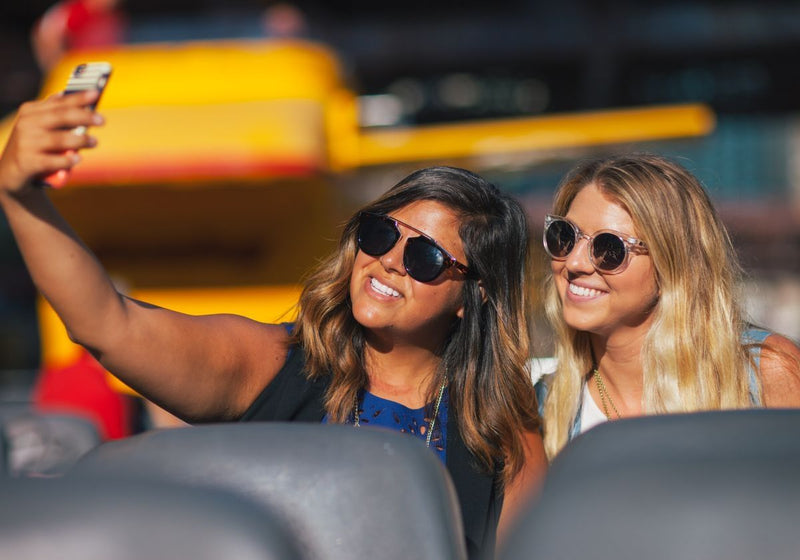 two-women-taking-a-selfie-on-river-lake-architectural-tour