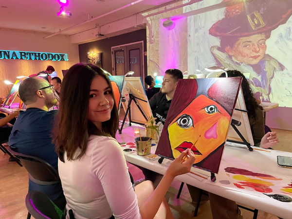 Four people painting.png