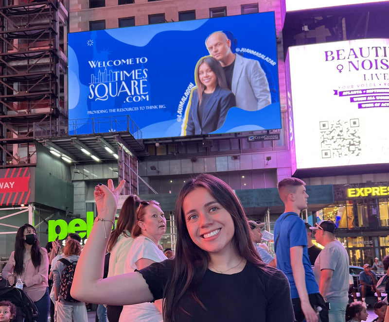 welcome-to-times-square-billboard-with-girl-standing-under