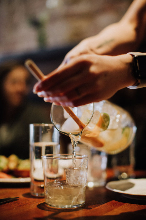 Serving Jamon plate at Huertas.jpeg