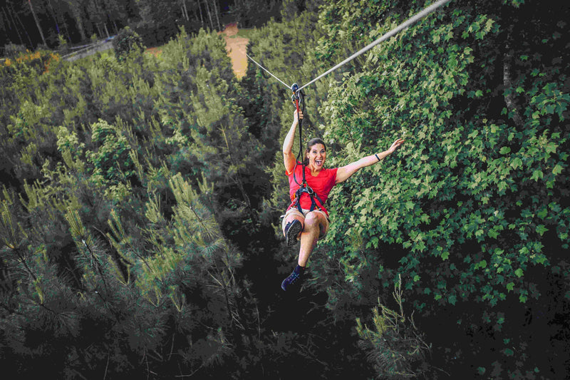 woman-in-red-loving-her-zip-line-time