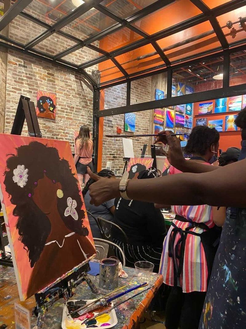 woman-painting-a-woman