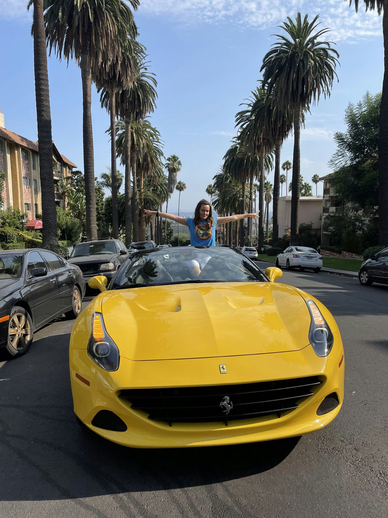 yellow-ferrri-parked-on-street