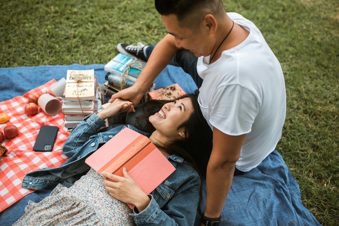 couple enjoying a picnic in the park