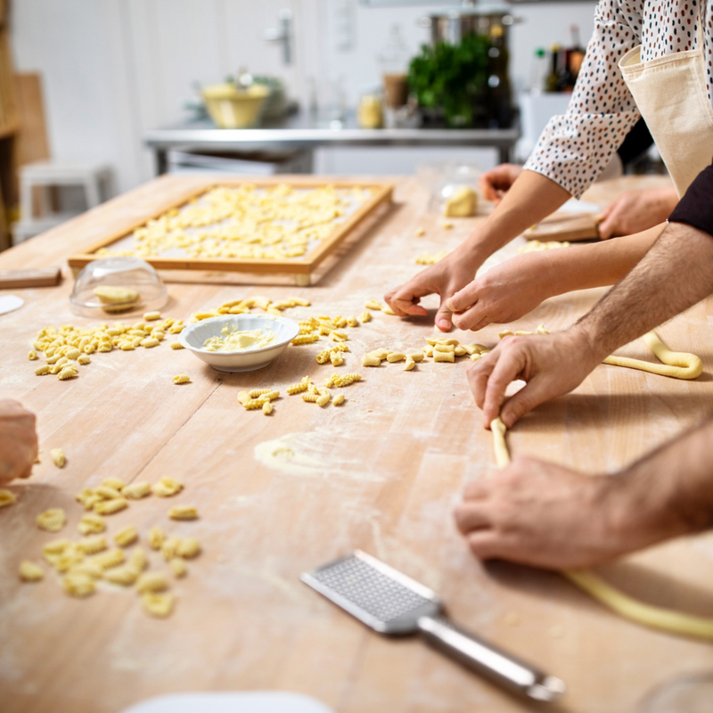 Class rolling up dough with hands