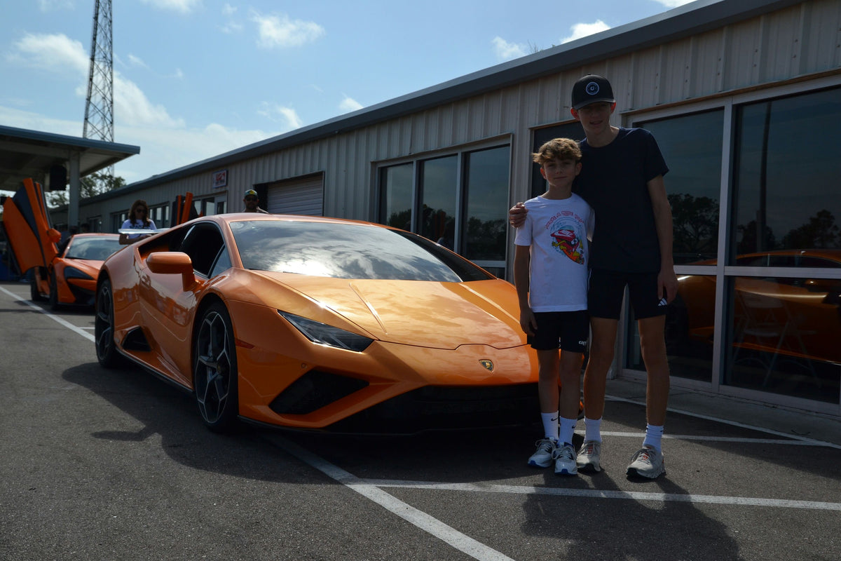 2-boys-with-sports-car