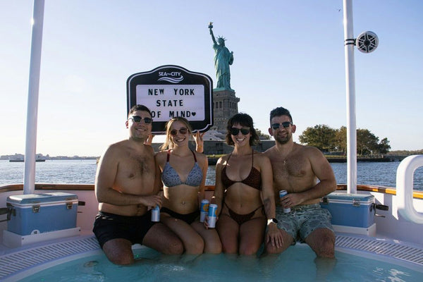2-couples-in-hot-tub-with-drinks
