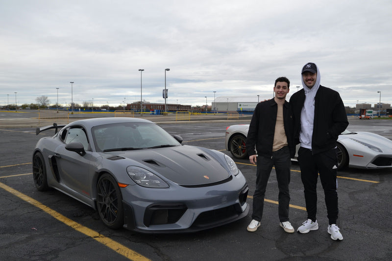 2 guys with super car