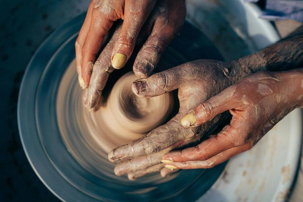 2-hands-shaping-pottery