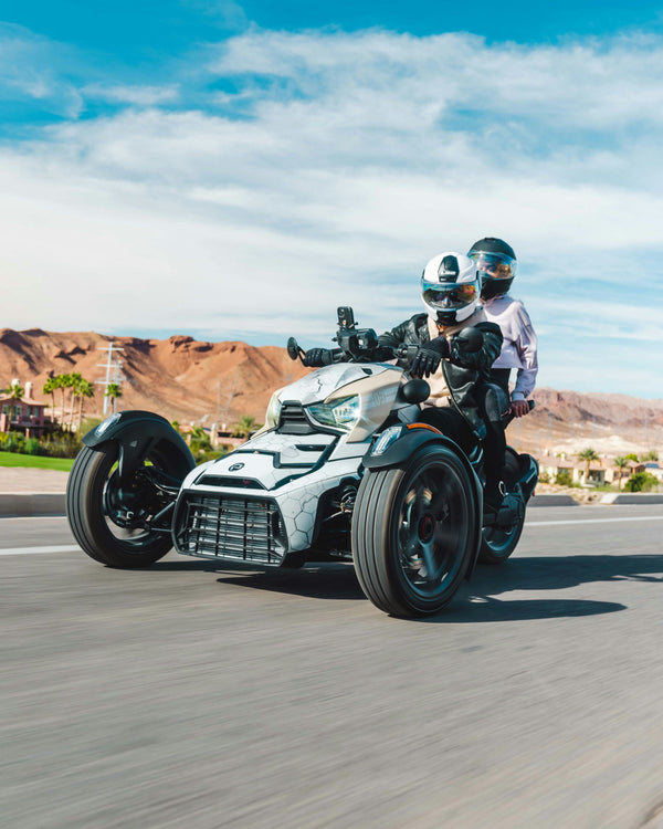 2 people on motor bike