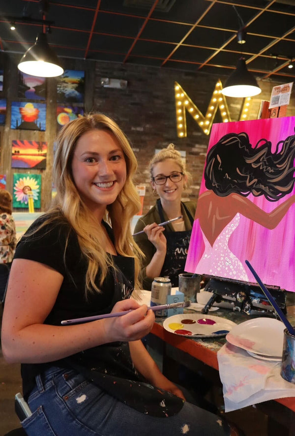 2 women painting women