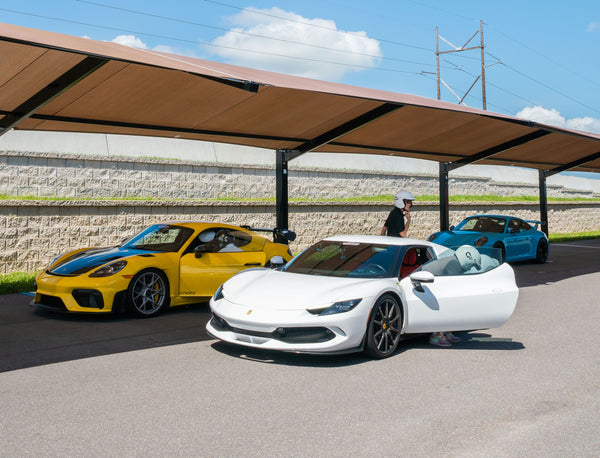 riding in white ferrari